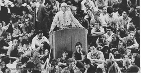 Herbert Marcuse lecturing in the middle of a crowd of students at the Berlin Free University in 1968