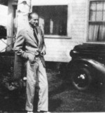 Herbert outside his home in 1937