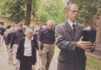 Frances and Peter Marcuse following Herbert's urn, July 18, 2003