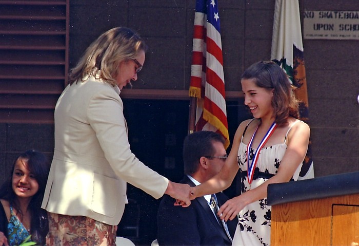 Shaking the principal's hand